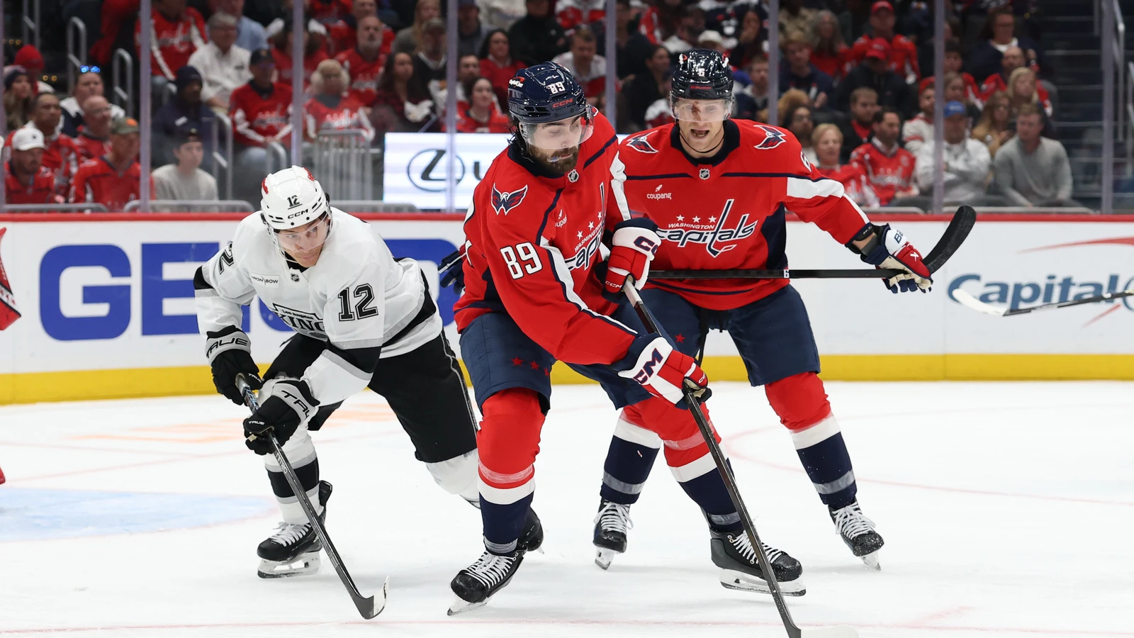 File photo: Washington Capitals forward Alex Tuch plays the puck against the Los Angeles Kings at Capital One Arena.