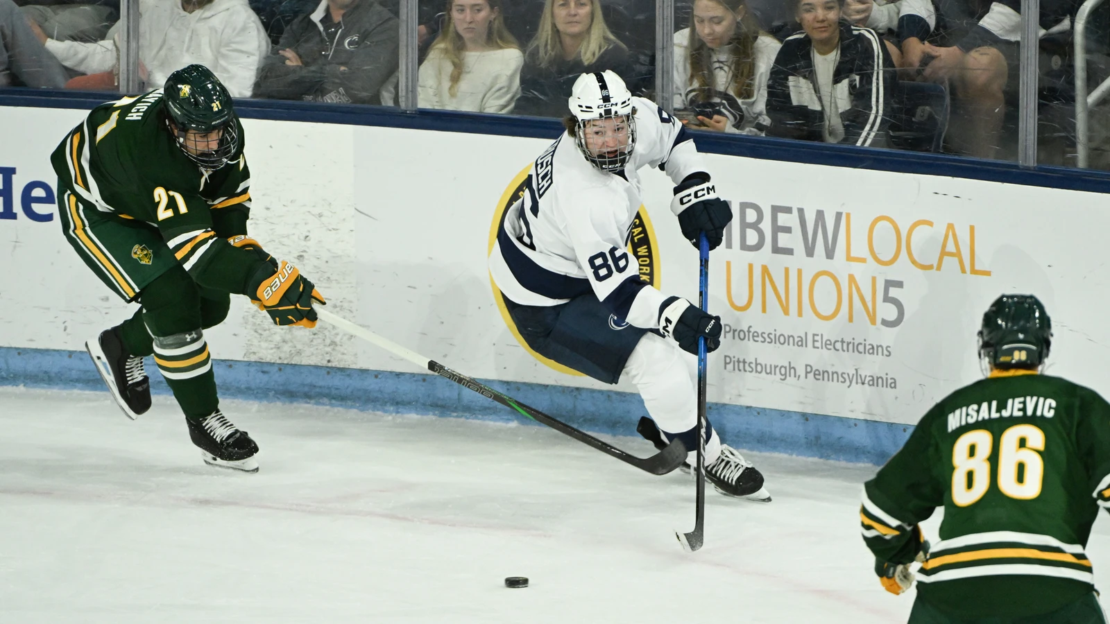 Clarkson defenseman Matthew Mayich, No. 21, pursues Penn State's JJ Wiebusch during a game on October 10, 2025. File photo.