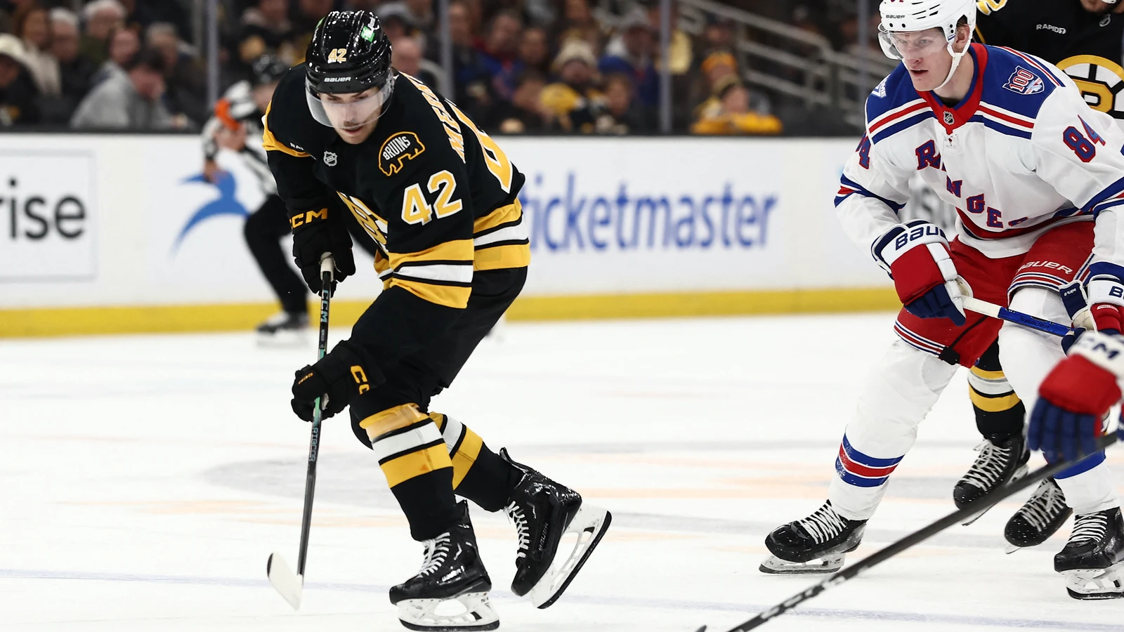 Georgii Merkulov carries the puck for Boston against the New York Rangers on November 28, 2025. File photo.