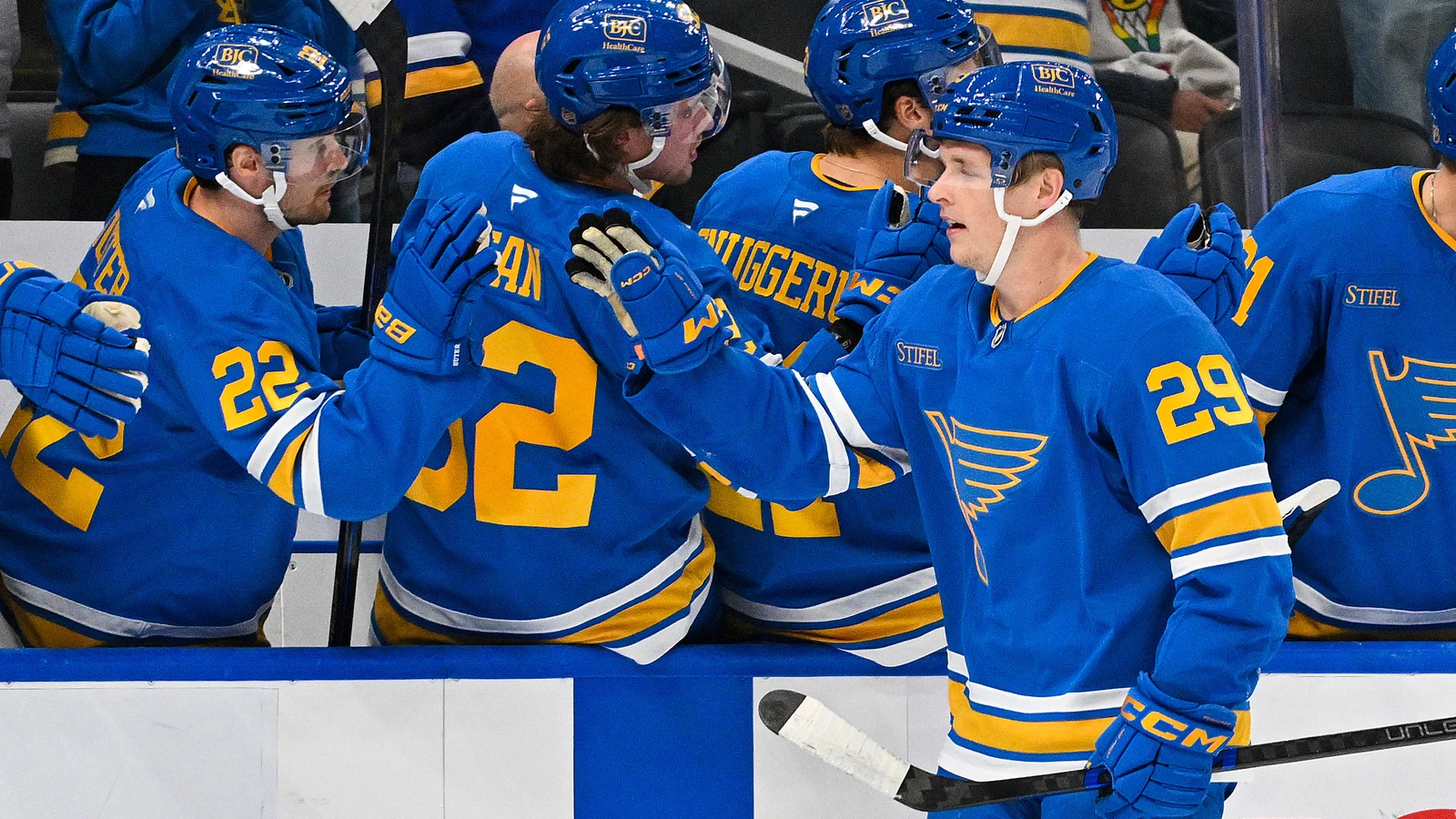 St. Louis Blues winger Jonatan Berggren celebrates his third-period goal with teammates at the bench.