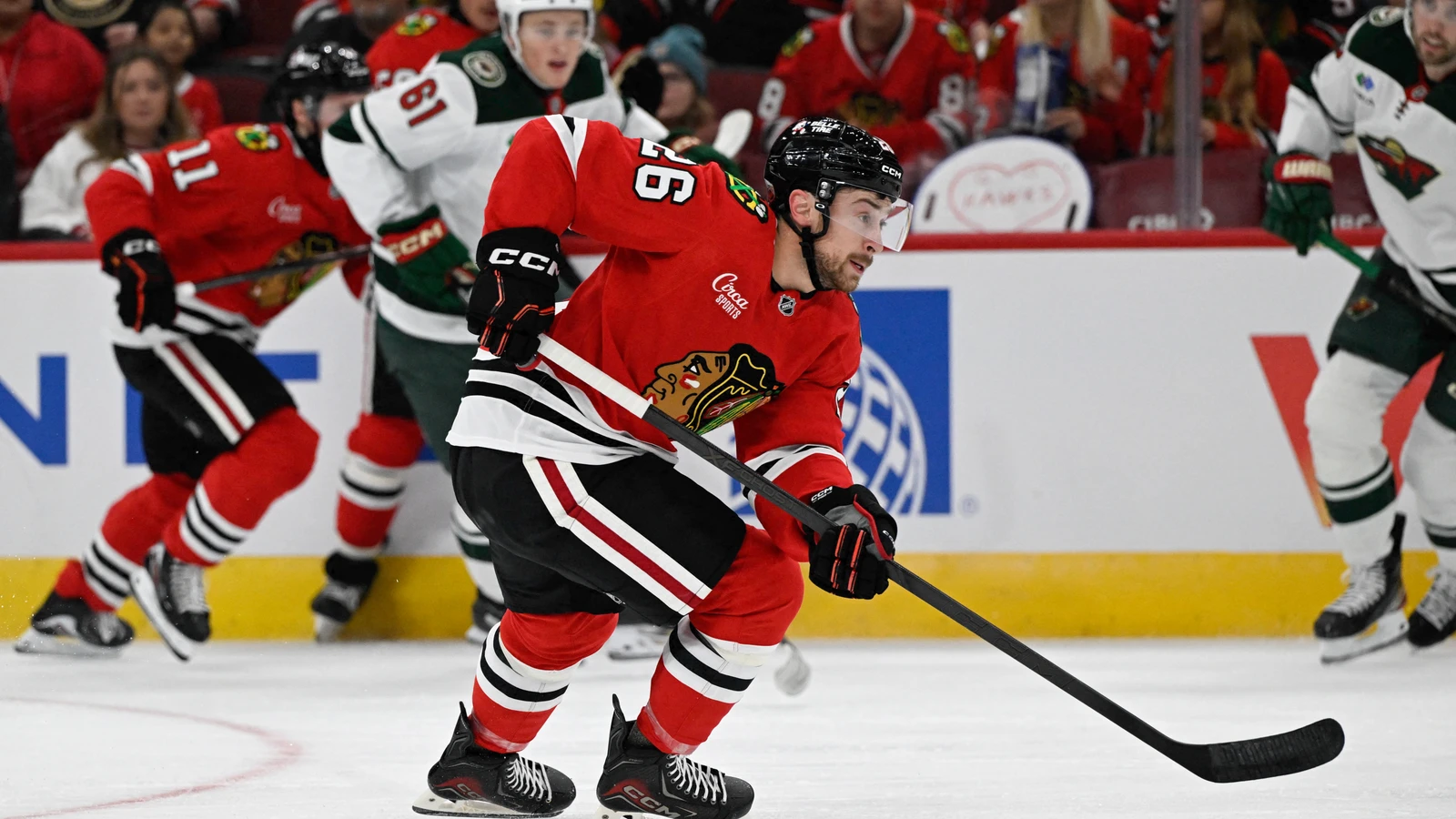 File photo: Chicago Blackhawks forward Andrew Mangiapane carries the puck against the Minnesota Wild at United Center.