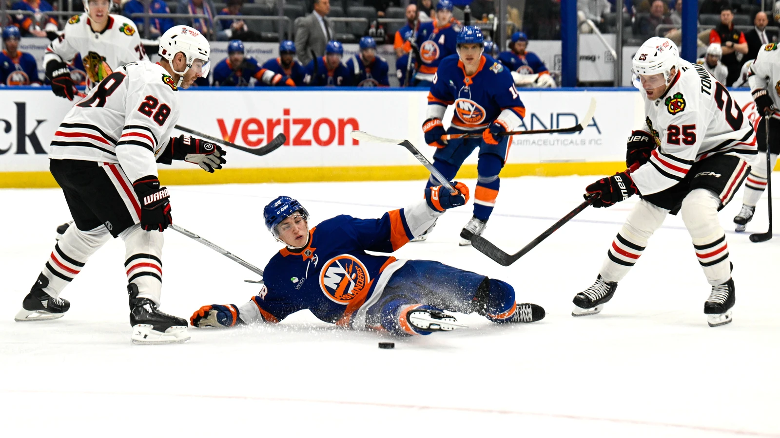 File photo: Chicago Blackhawks forward Dominic Toninato defends against New York Islanders forward Victor Eklund.