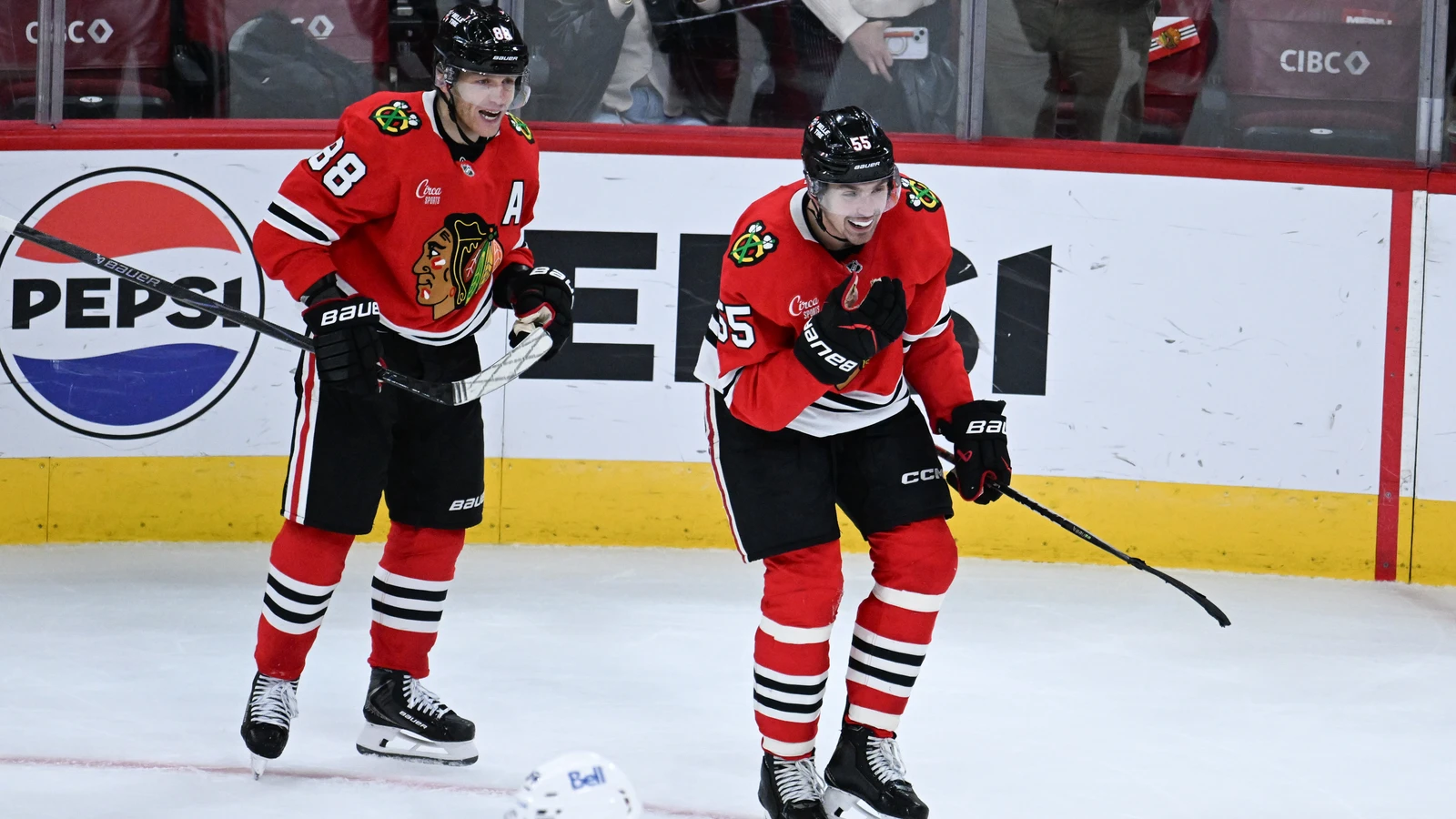 File photo: Chicago Blackhawks defenceman Artyom Levshunov celebrates his overtime goal with Patrick Kane at the United Center.