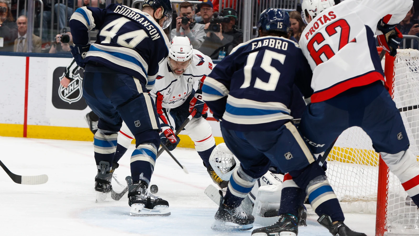 Jet Greaves makes a save for Columbus as Washington's Alex Ovechkin looks for a rebound on April 14, 2026. File photo.