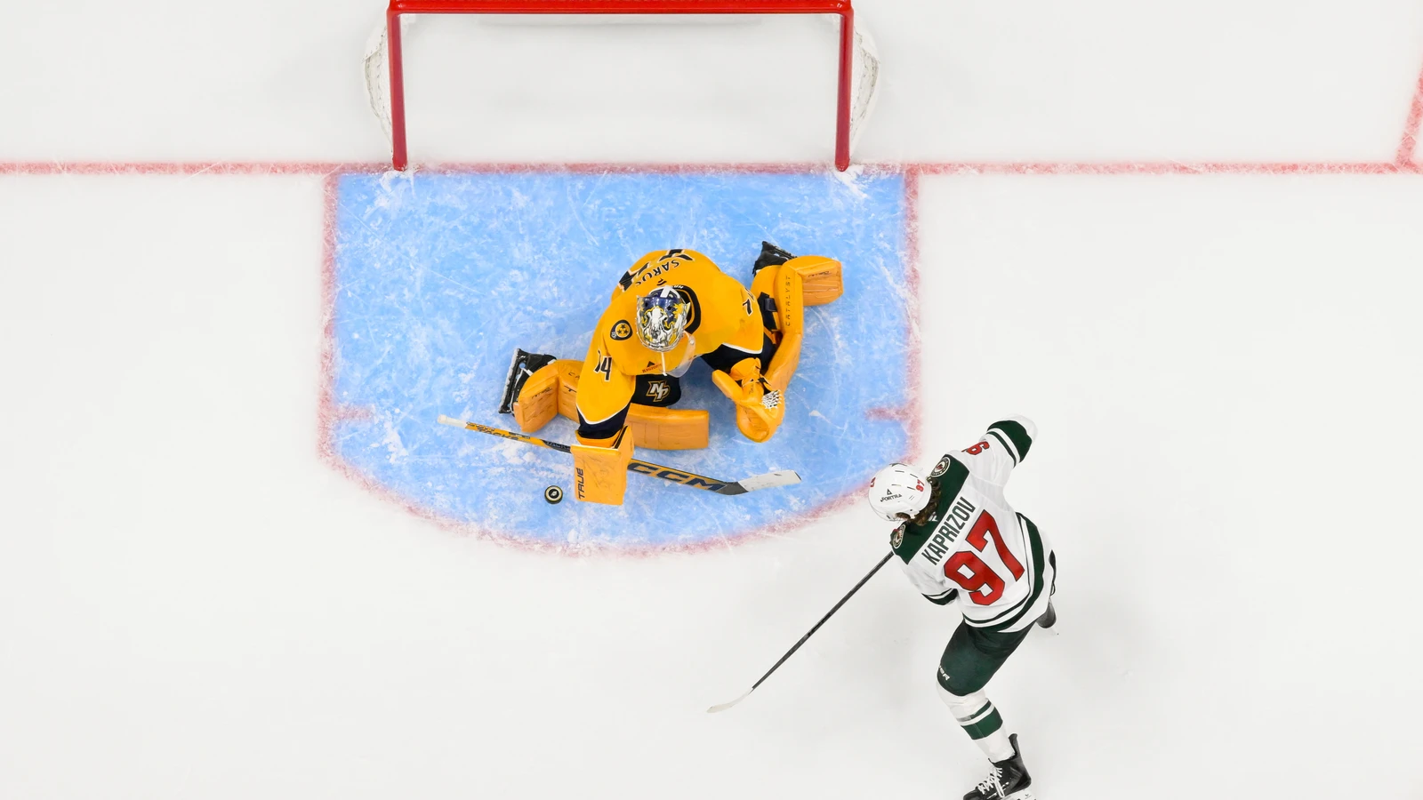 File photo: Minnesota Wild forward Kirill Kaprizov shoots against Nashville Predators goaltender Juuse Saros at Bridgestone Arena.
