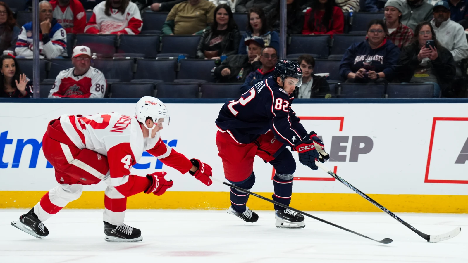 File photo: Columbus Blue Jackets forward Mikael Pyyhtia skates with the puck against the Detroit Red Wings.