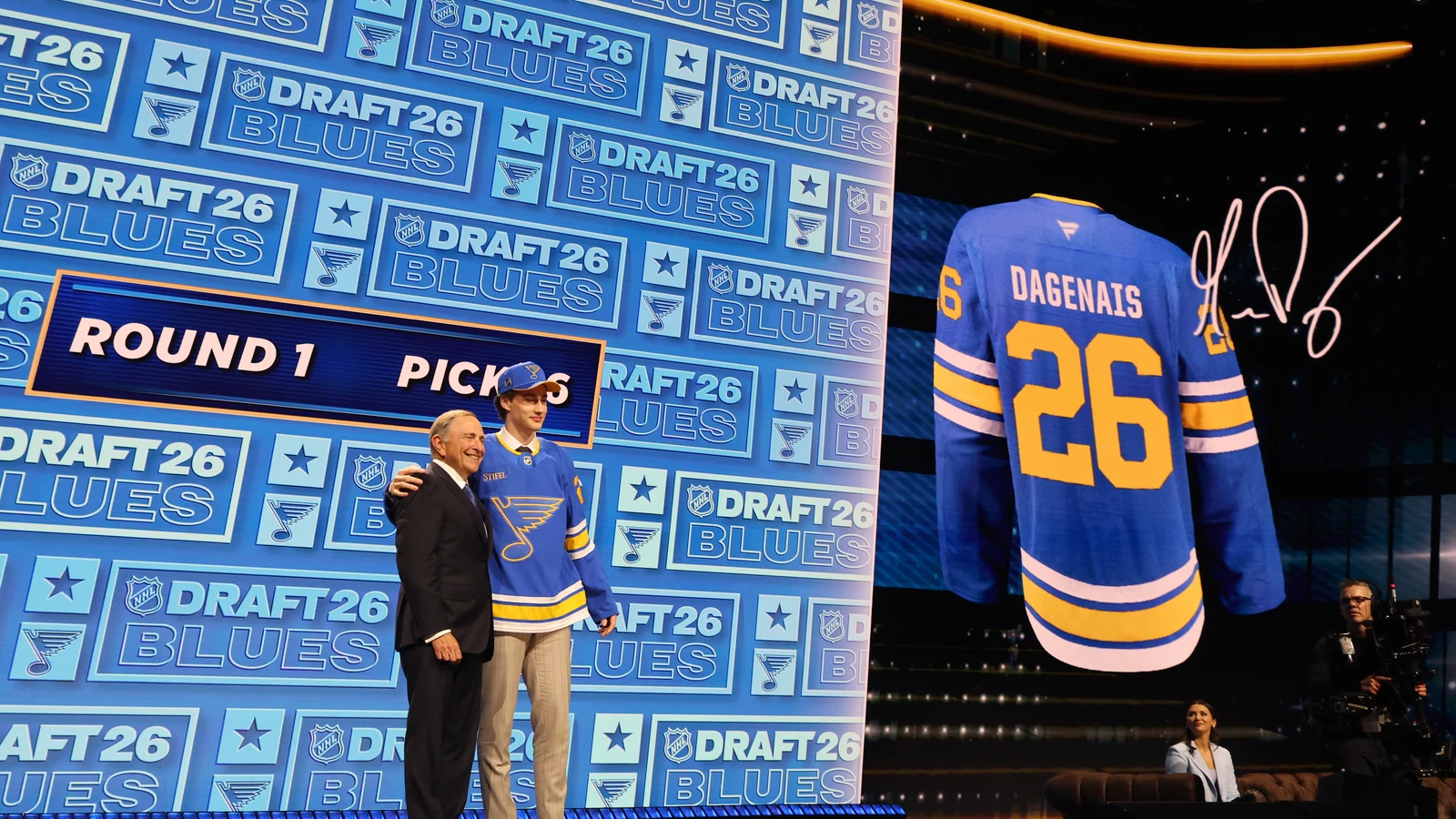 St. Louis Blues first-round pick Maddox Dagenais poses with NHL commissioner Gary Bettman at the 2026 NHL Draft on June 26, 2026. File photo.