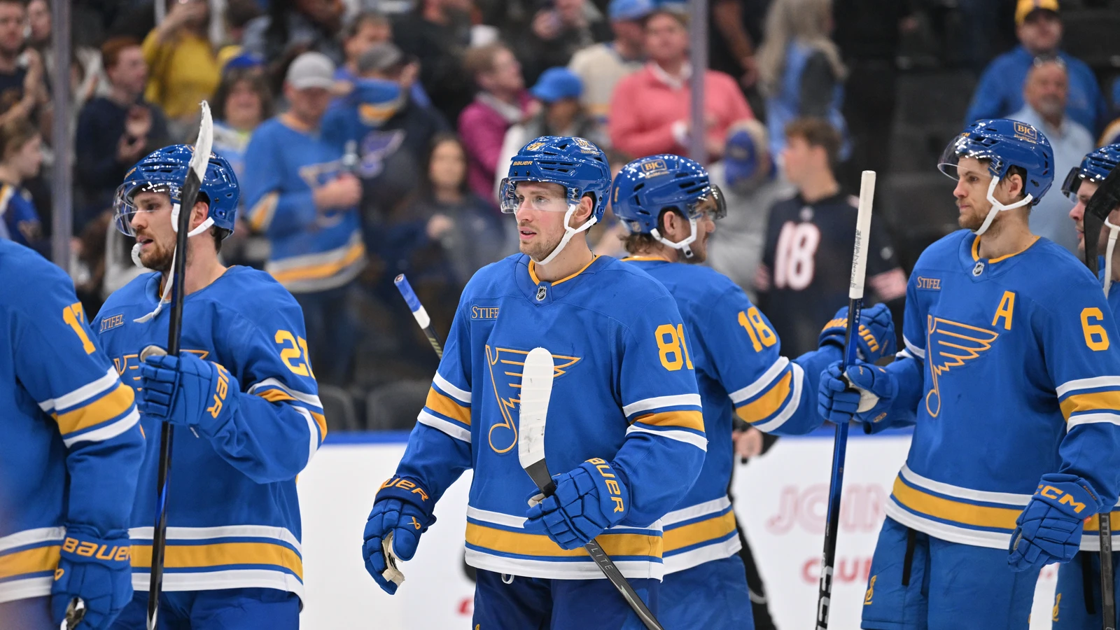 File photo: St. Louis Blues players gather on the ice after a victory at Enterprise Center.