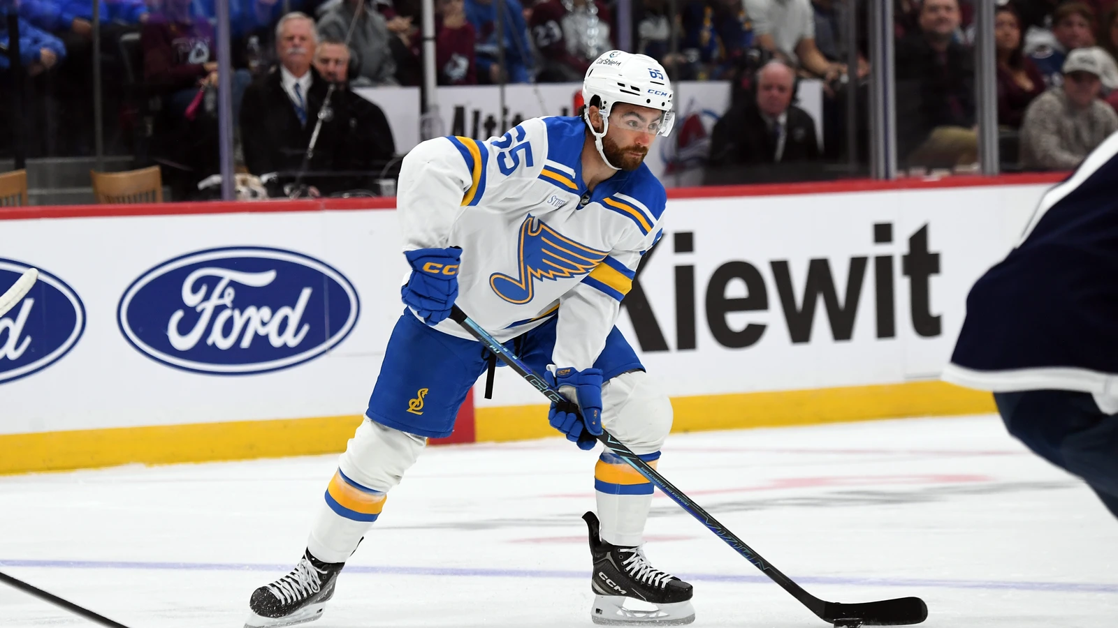 File photo: St. Louis Blues centre Dillon Dube looks to pass the puck against the Colorado Avalanche at Ball Arena.
