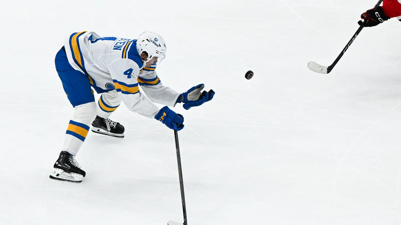 File photo: St. Louis Blues defenceman Theo Lindstein plays the puck against the Chicago Blackhawks at United Center.