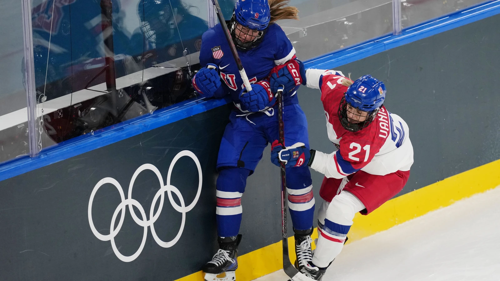 United States defender Haley Winn is checked by Czechia forward Tereza Vanisova during Olympic group play in Milan on February 5, 2026. File photo.