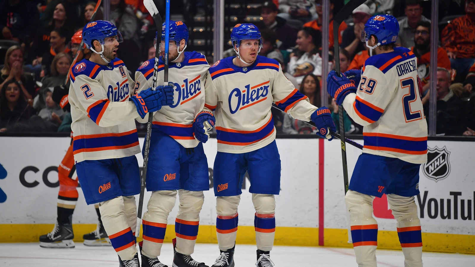 Evan Bouchard celebrates his goal with Edmonton Oilers teammates during the second period against the Anaheim Ducks at Honda Center.