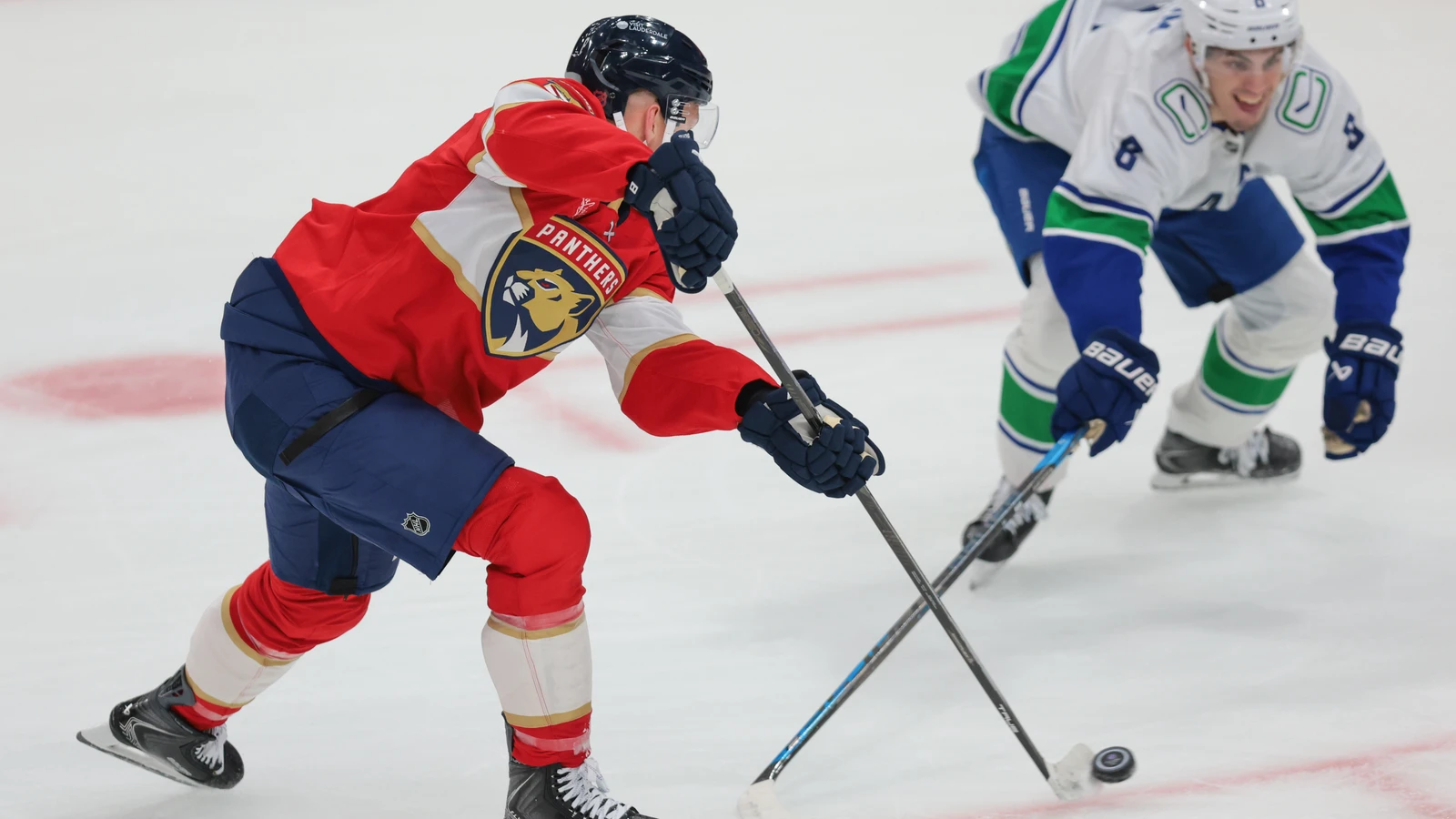 Brady Tkachuk shoots for the Florida Panthers against the Vancouver Canucks in overtime.