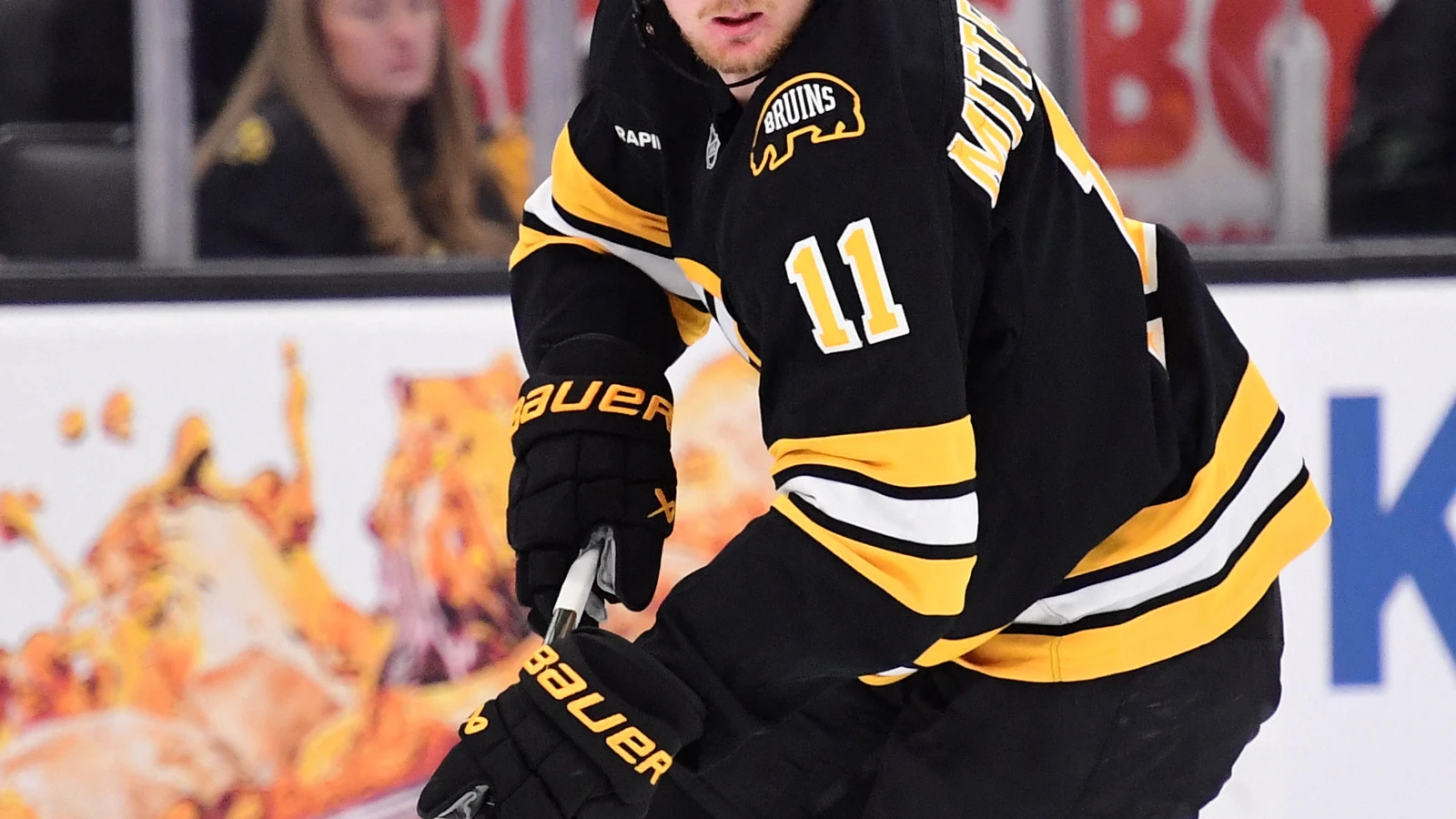 File photo: Boston Bruins forward Casey Mittelstadt skates with the puck at TD Garden.