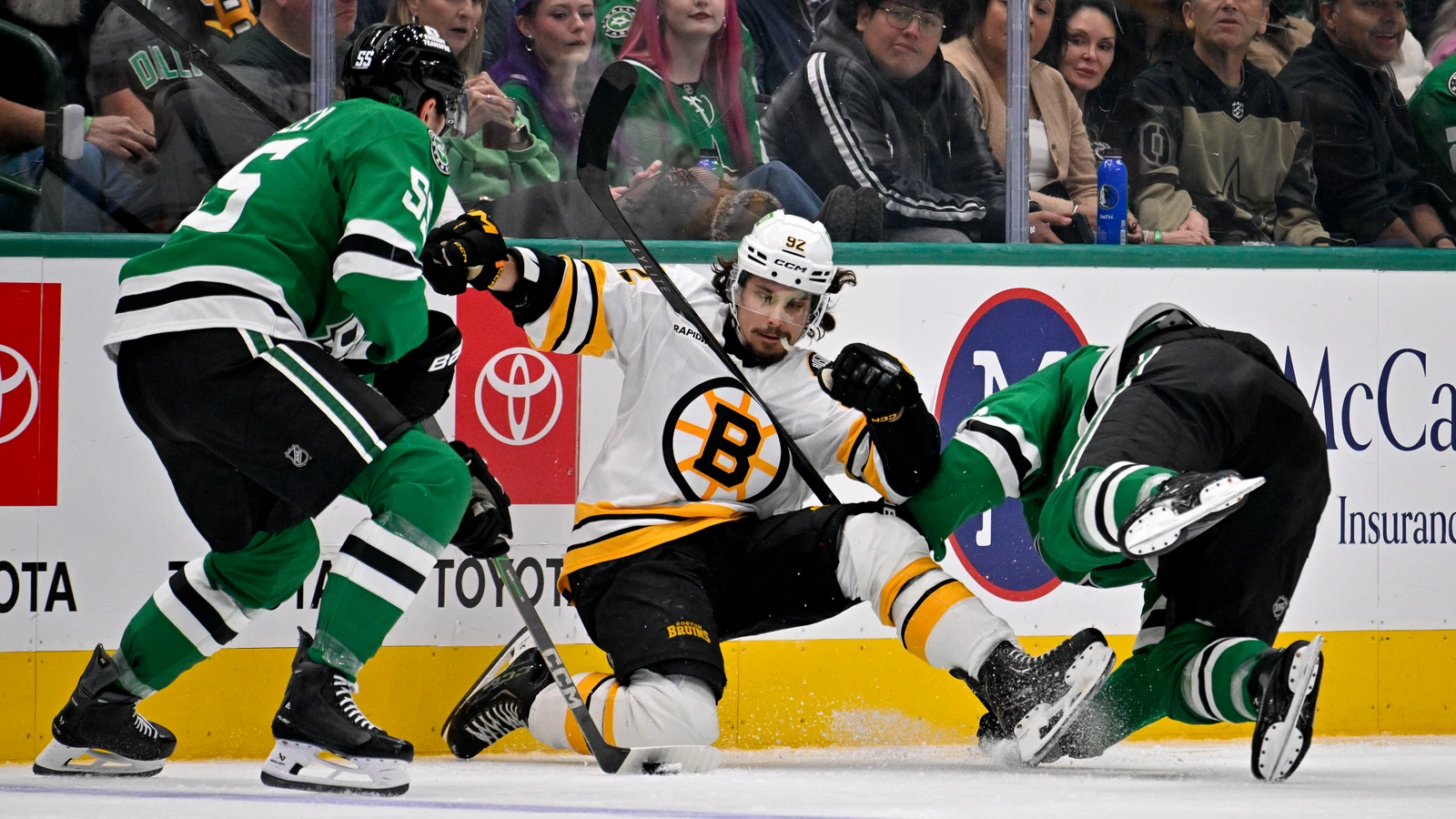 File photo: Boston Bruins forward Marat Khusnutdinov battles for the puck against the Dallas Stars at American Airlines Center.