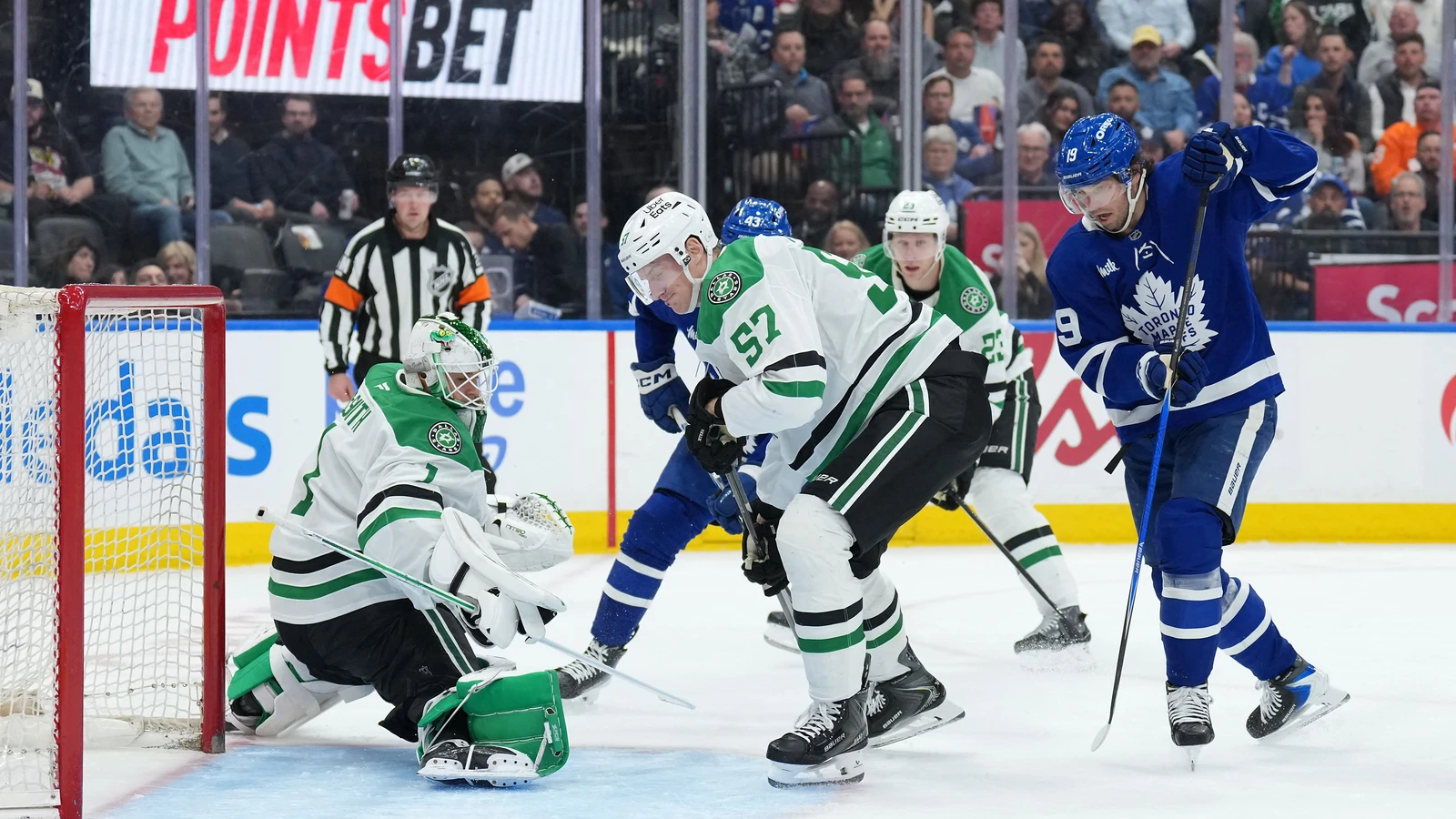 Calle Jarnkrok battles Tyler Myers for Toronto against Dallas on April 13, 2026. File photo.