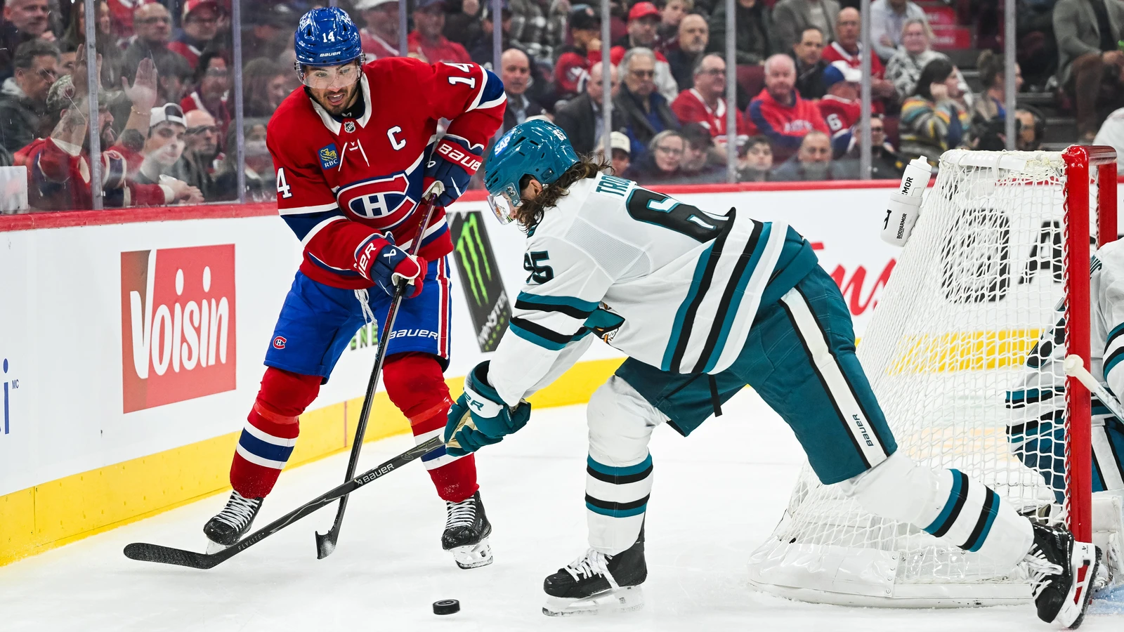 File photo: Montreal Canadiens captain Nick Suzuki controls the puck against the San Jose Sharks at Bell Centre.