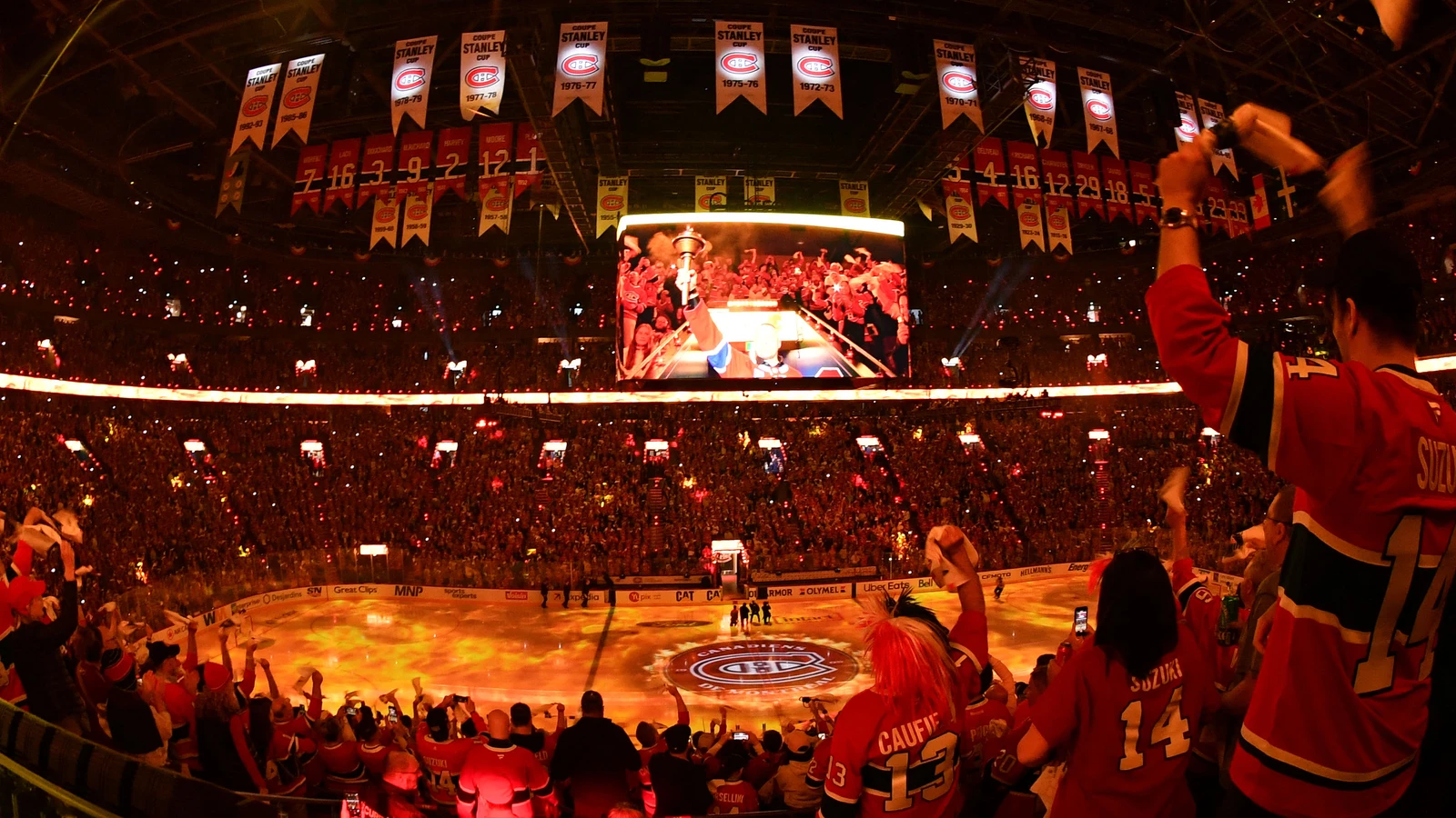 File photo: Canadiens fans fill the Bell Centre beneath championship banners before a playoff game in Montreal.
