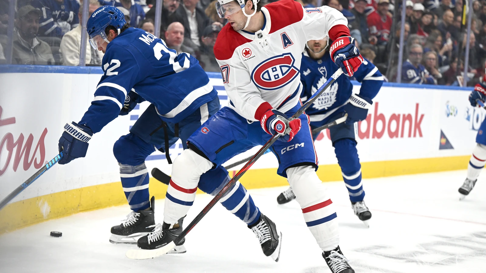 Montreal Canadiens forward Josh Anderson (17) battles for the puck against Toronto Maple Leafs defenceman Jake McCabe (22) during the second period in Toronto on Sept. 29, 2026.