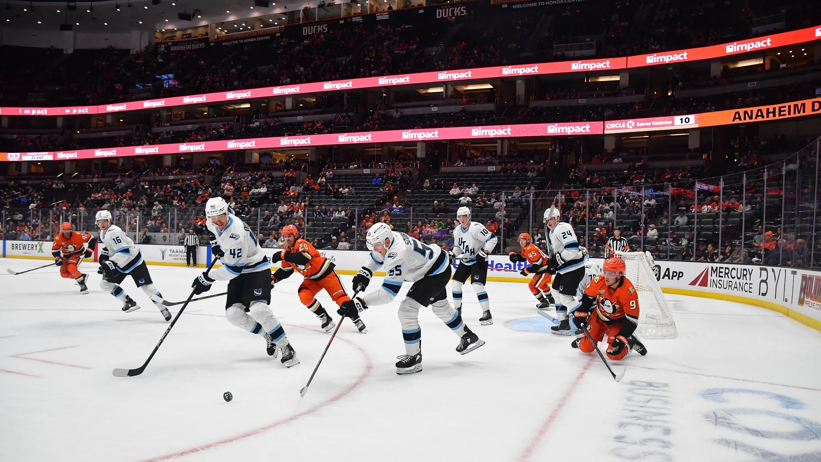 Maksymilian Szuber passes the puck for Utah against Anaheim on September 22, 2025. File photo.