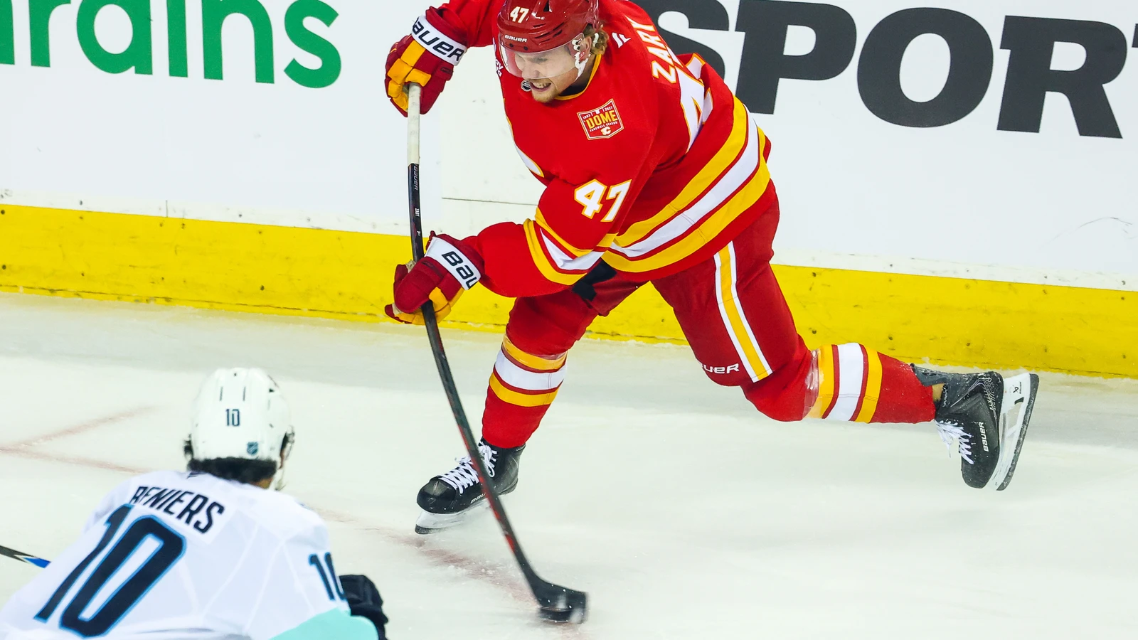 File photo: Calgary Flames centre Connor Zary shoots the puck against the Seattle Kraken at Scotiabank Saddledome.