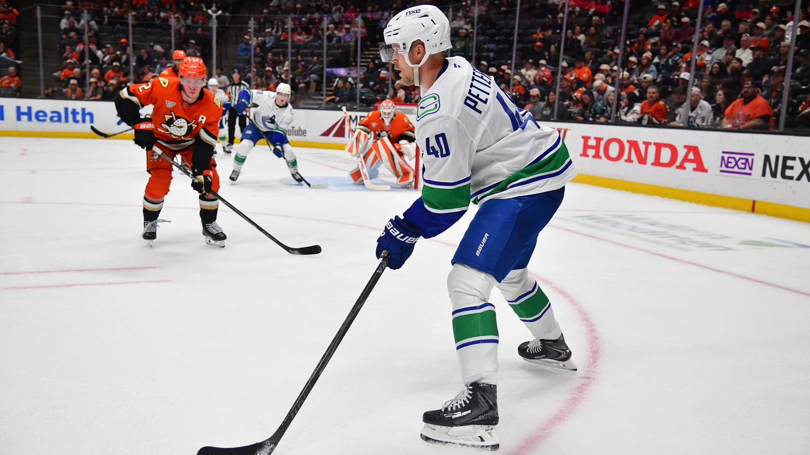 Vancouver Canucks centre Elias Pettersson controls the puck against the Anaheim Ducks.