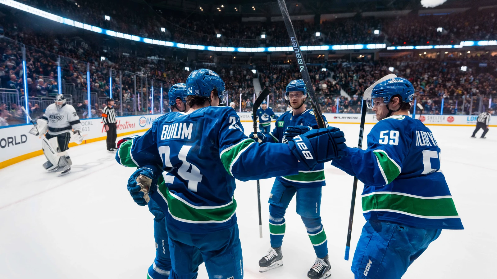 File photo: Vancouver Canucks defenceman Zeev Buium celebrates his goal with teammates against the Los Angeles Kings in Vancouver on April 14, 2026.