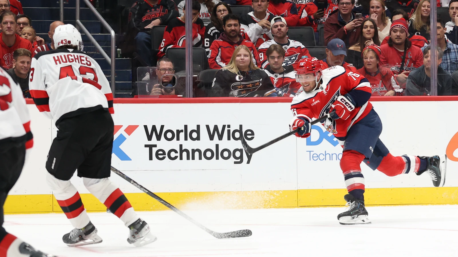 File photo: Washington Capitals centre Jonny Brodzinski shoots as New Jersey Devils defenceman Luke Hughes defends.
