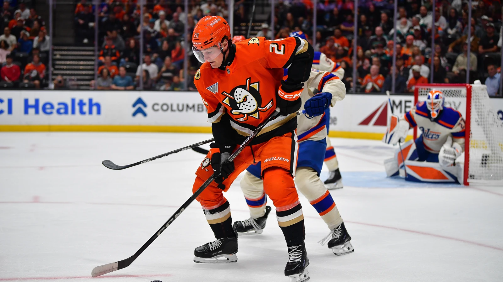File photo: Anaheim Ducks forward Judd Caulfield carries the puck against the Edmonton Oilers at Honda Center.