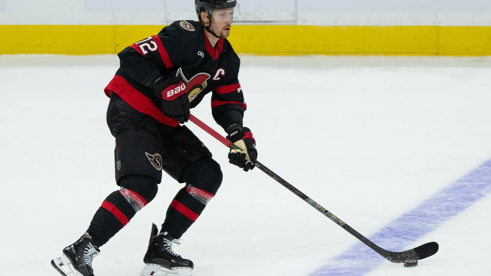 File photo: Ottawa Senators defenceman Thomas Chabot skates with the puck against the New York Islanders at Canadian Tire Centre.