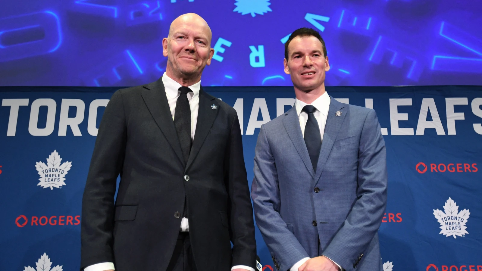 Toronto Maple Leafs general manager John Chayka, right, poses with senior executive adviser Mats Sundin after a news conference on May 4, 2026. File photo.