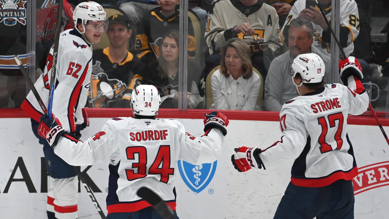 Justin Sourdif celebrates a Capitals goal with teammates against Pittsburgh in April 2026.