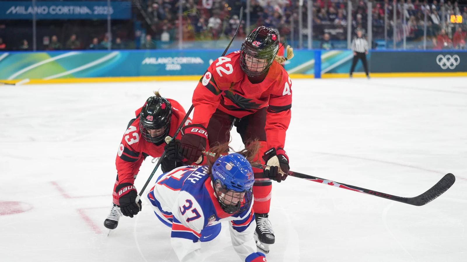 File photo: Canada defender Claire Thompson (42) checks a United States player during the Olympic women’s hockey tournament in Milan on February 10, 2026.