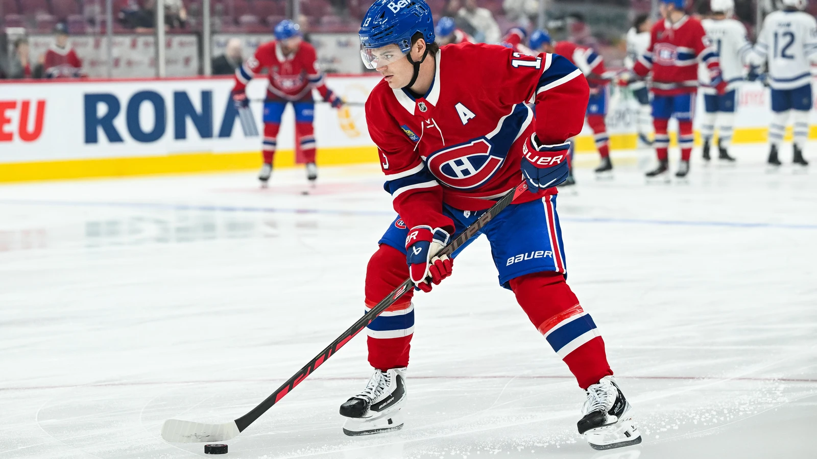 File photo: Montreal Canadiens forward Cole Caufield (13) handles the puck during warm-up before the Sept. 19, 2026 preseason game against Toronto at Bell Centre.