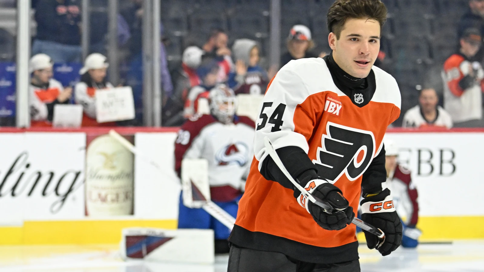 Cole Knuble skates in a Philadelphia Flyers jersey before his NHL debut against the Colorado Avalanche.