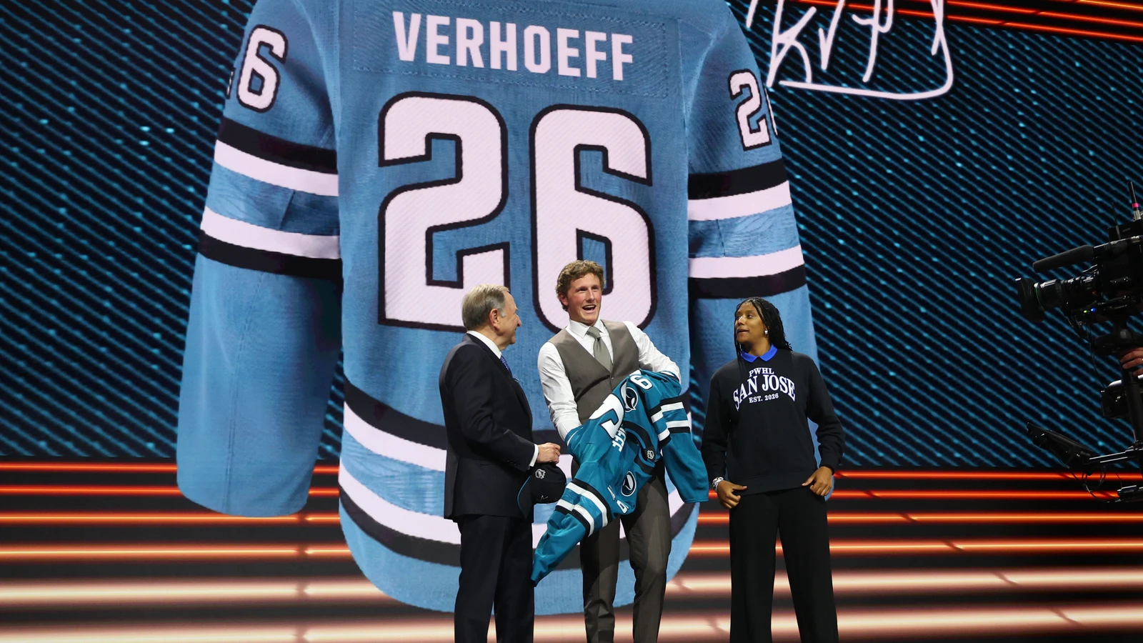 Laila Edwards, right, joins Keaton Verhoeff and Gary Bettman after Verhoeff is selected by San Jose at the 2026 NHL Draft in Buffalo. File photo; this is roster context, not PWHL San Jose game action.