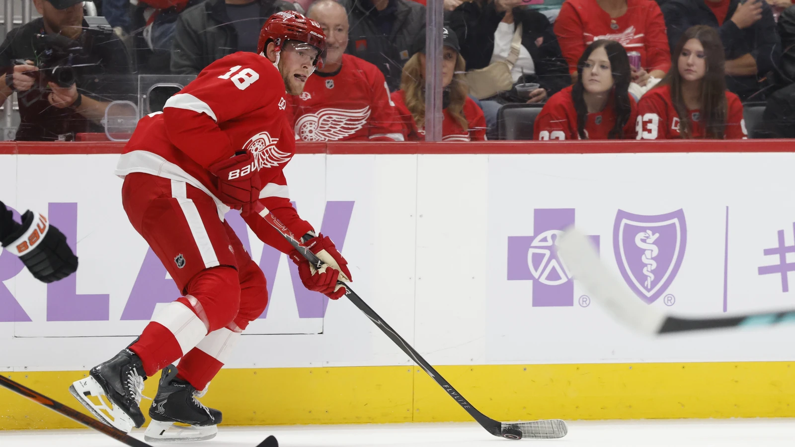 Andrew Copp skates with the puck against the Philadelphia Flyers at Little Caesars Arena on Oct. 15, 2026.