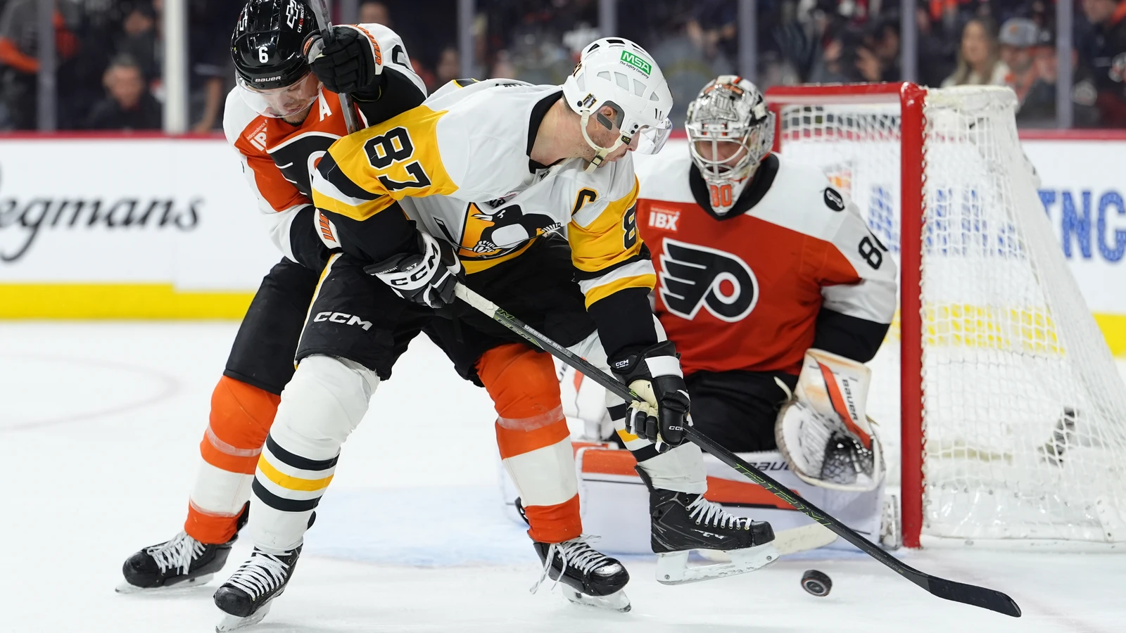 Sidney Crosby battles for the puck against Philadelphia on April 29, 2026. File photo.