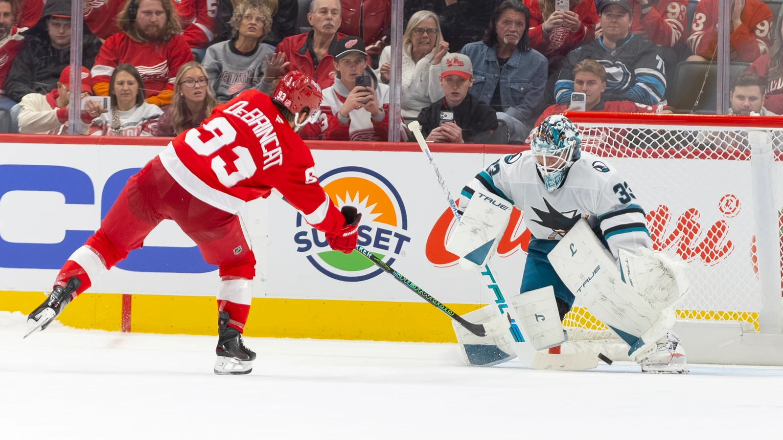 Detroit Red Wings forward Alex DeBrincat shoots against San Jose Sharks goaltender Alex Nedeljkovic during the shootout at Little Caesars Arena on Oct. 17, 2026.