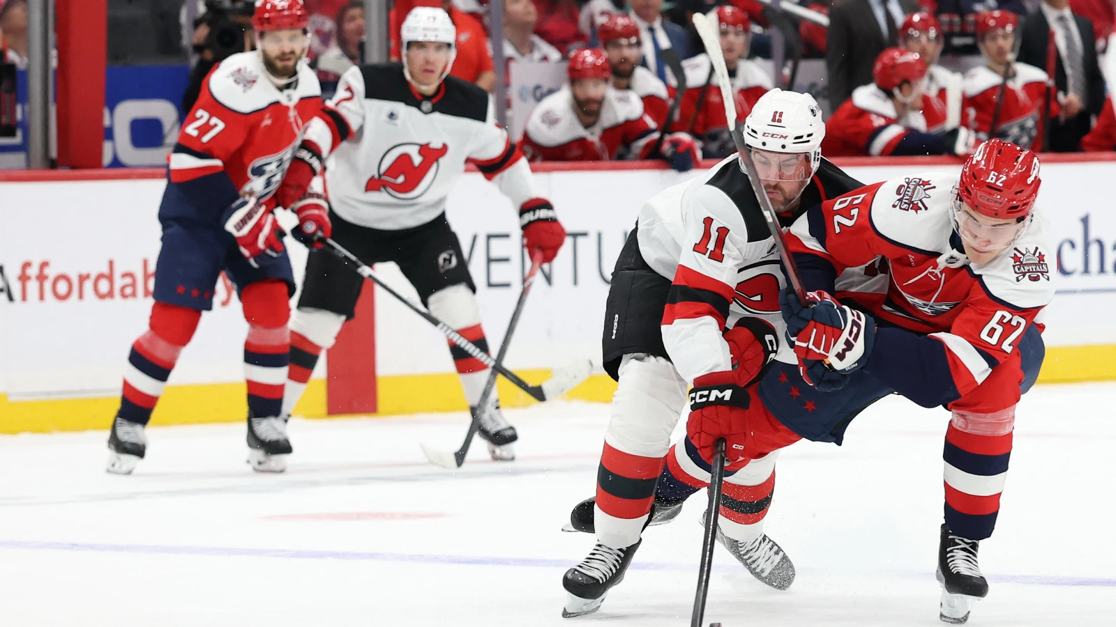 File photo: New Jersey Devils forward Stefan Noesen battles for the puck with a Washington Capitals player at Capital One Arena.