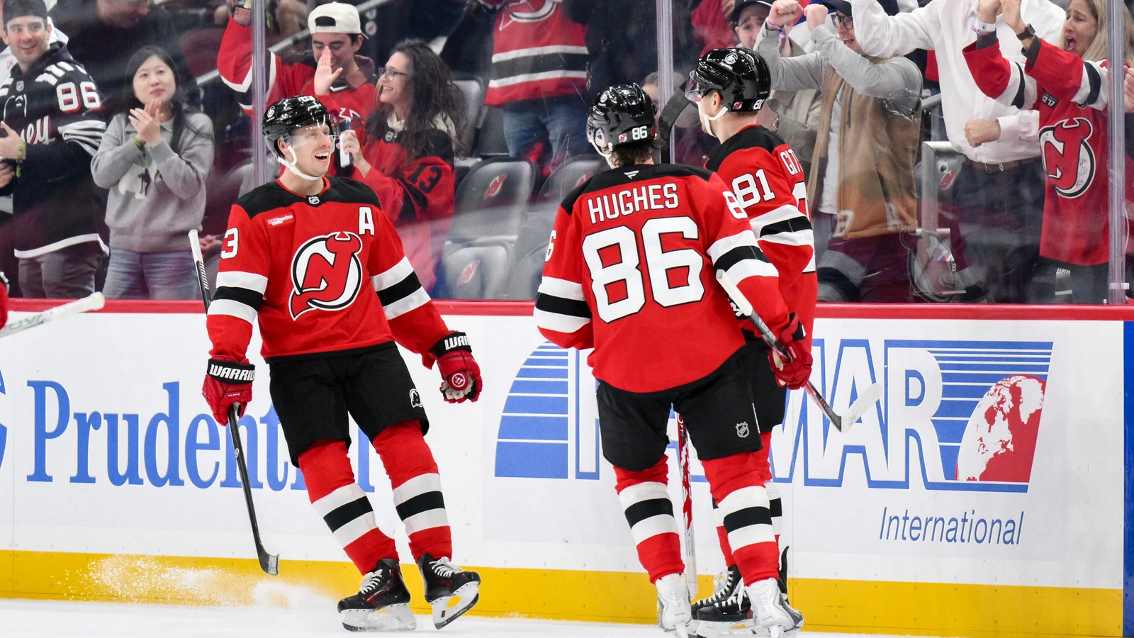 File photo: New Jersey Devils right wing Arseny Gritsyuk celebrates a goal with teammates at Prudential Center.