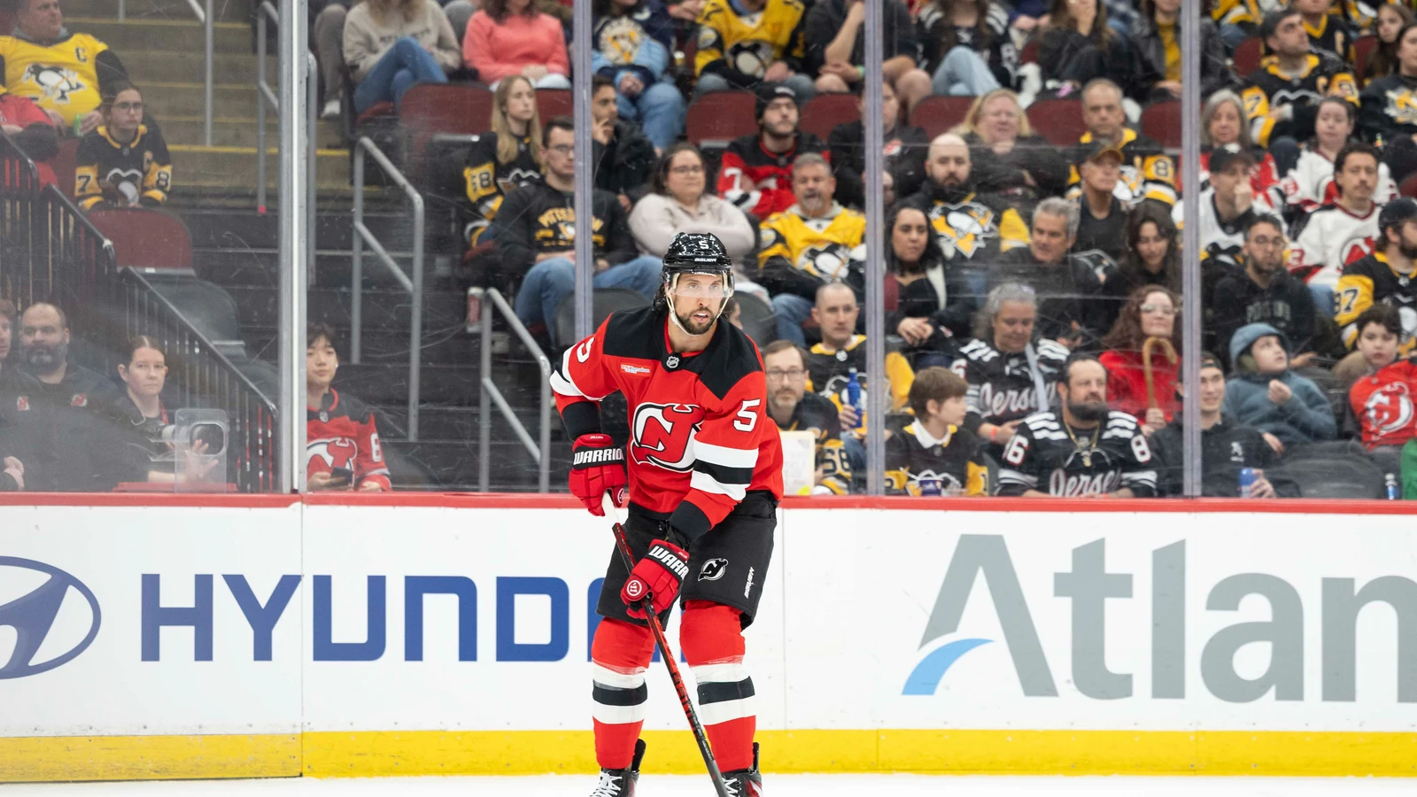 File photo: New Jersey Devils defenceman Brenden Dillon skates with the puck against the Pittsburgh Penguins in Newark on April 9, 2026.