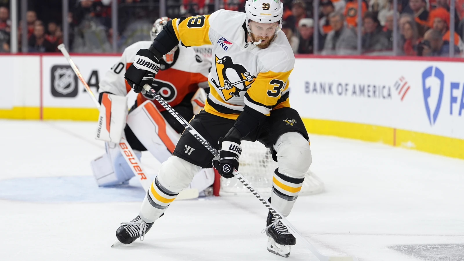 Anthony Mantha reaches for the puck while skating for Pittsburgh against Philadelphia on April 29, 2026. File photo.