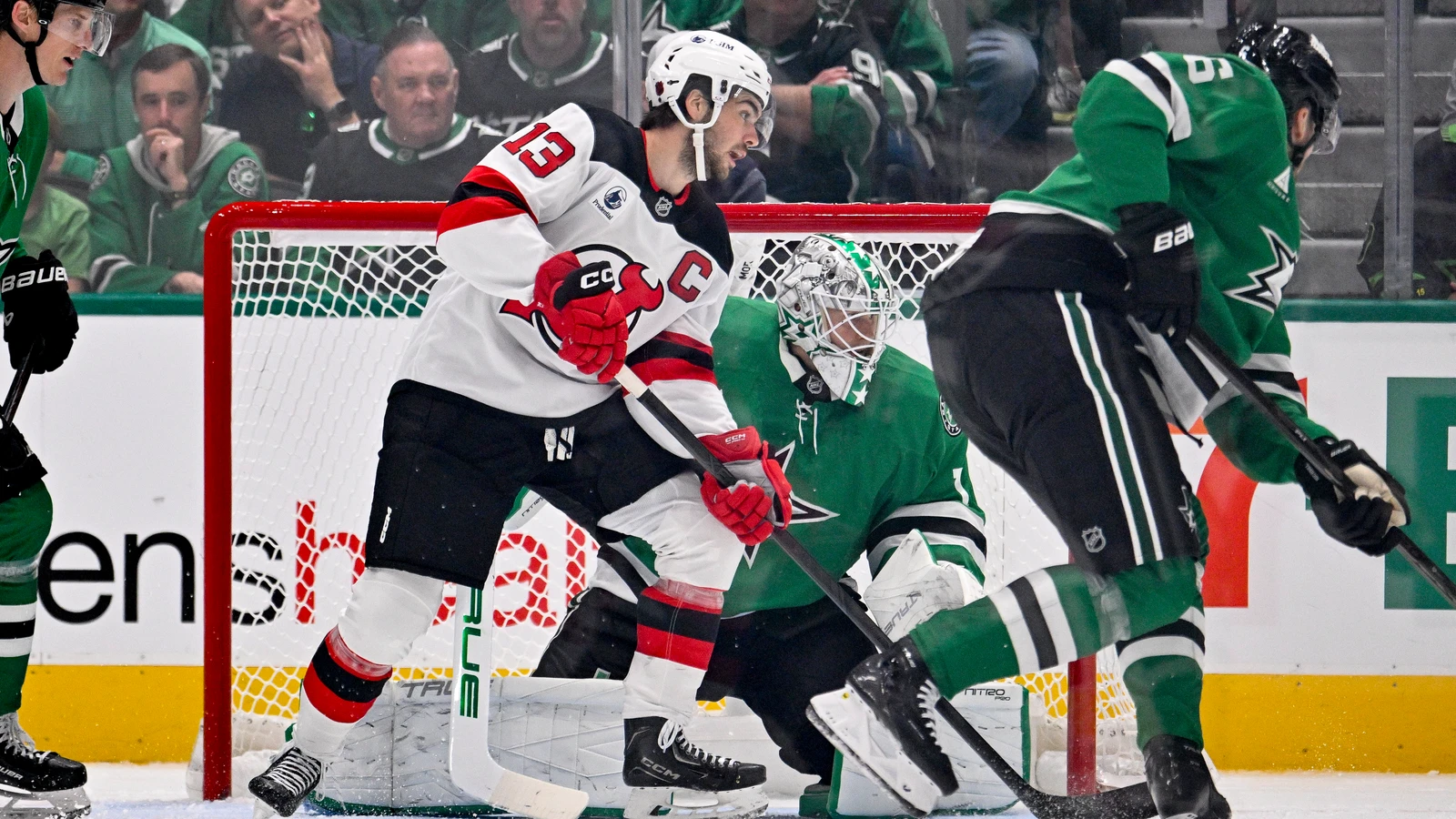 File photo: New Jersey Devils captain Nico Hischier tracks the puck in front of the Dallas Stars net at American Airlines Center.