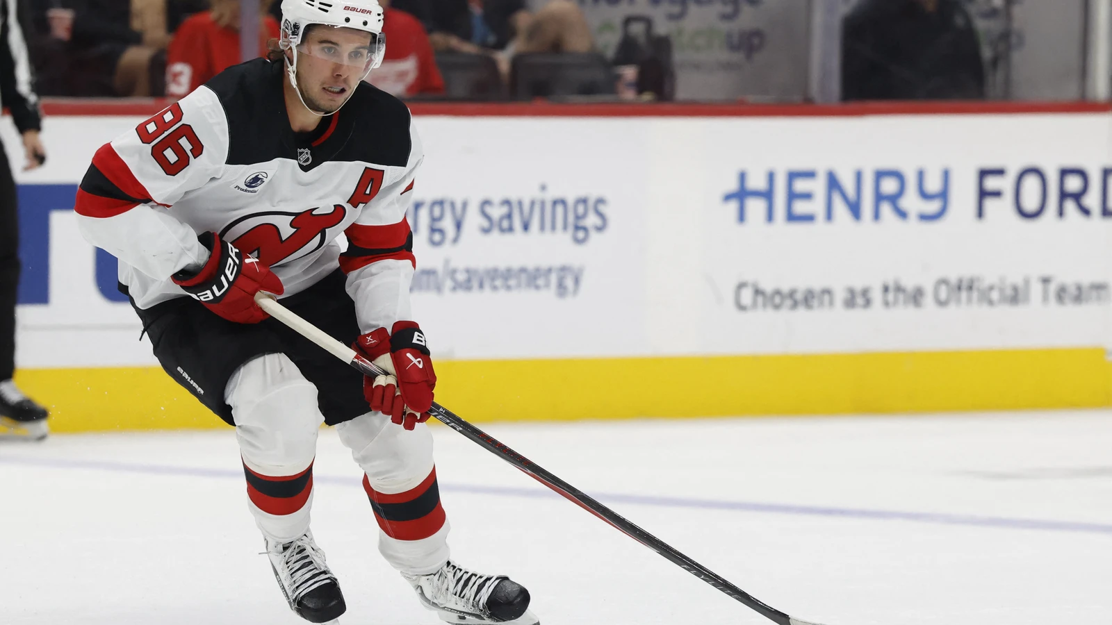 File photo: New Jersey Devils centre Jack Hughes skates with the puck against the Detroit Red Wings at Little Caesars Arena.