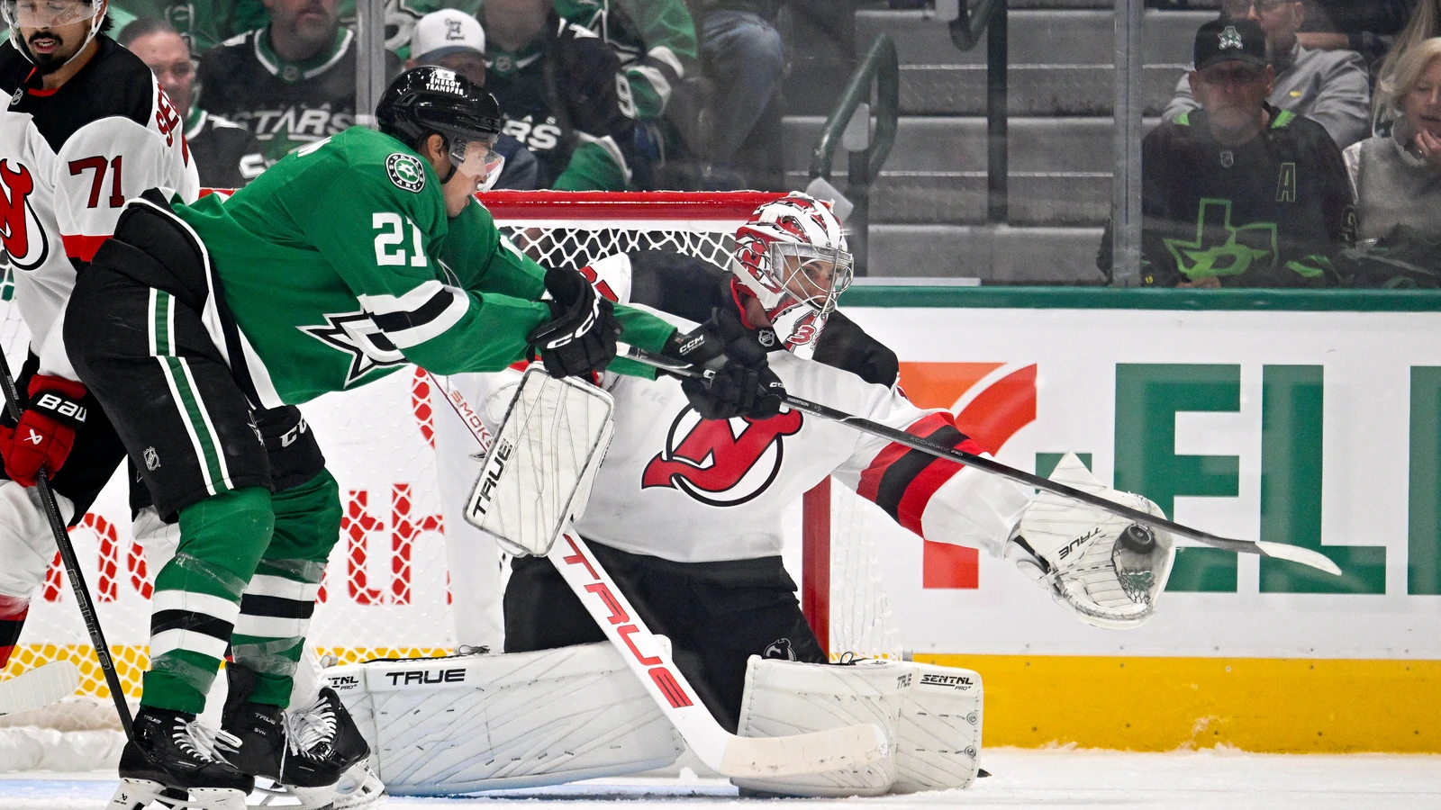 File photo: New Jersey Devils goaltender Connor Hellebuyck guards the net against the Dallas Stars at American Airlines Center.