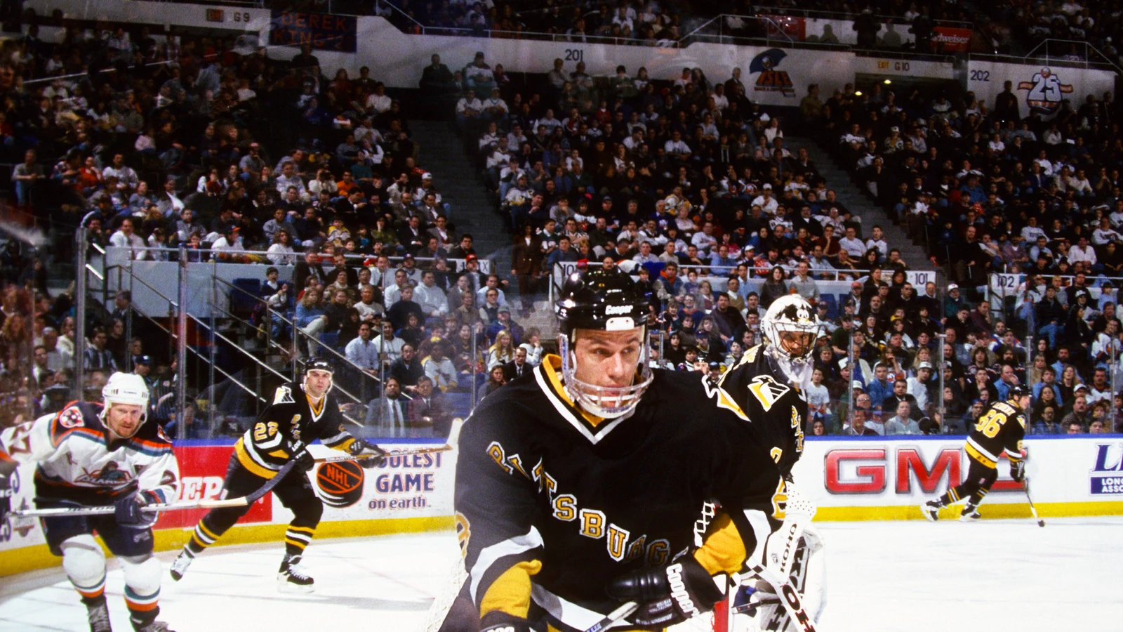 Pittsburgh Penguins center Domenic Pittis skates against the New York Islanders on January 7, 1997. File photo.