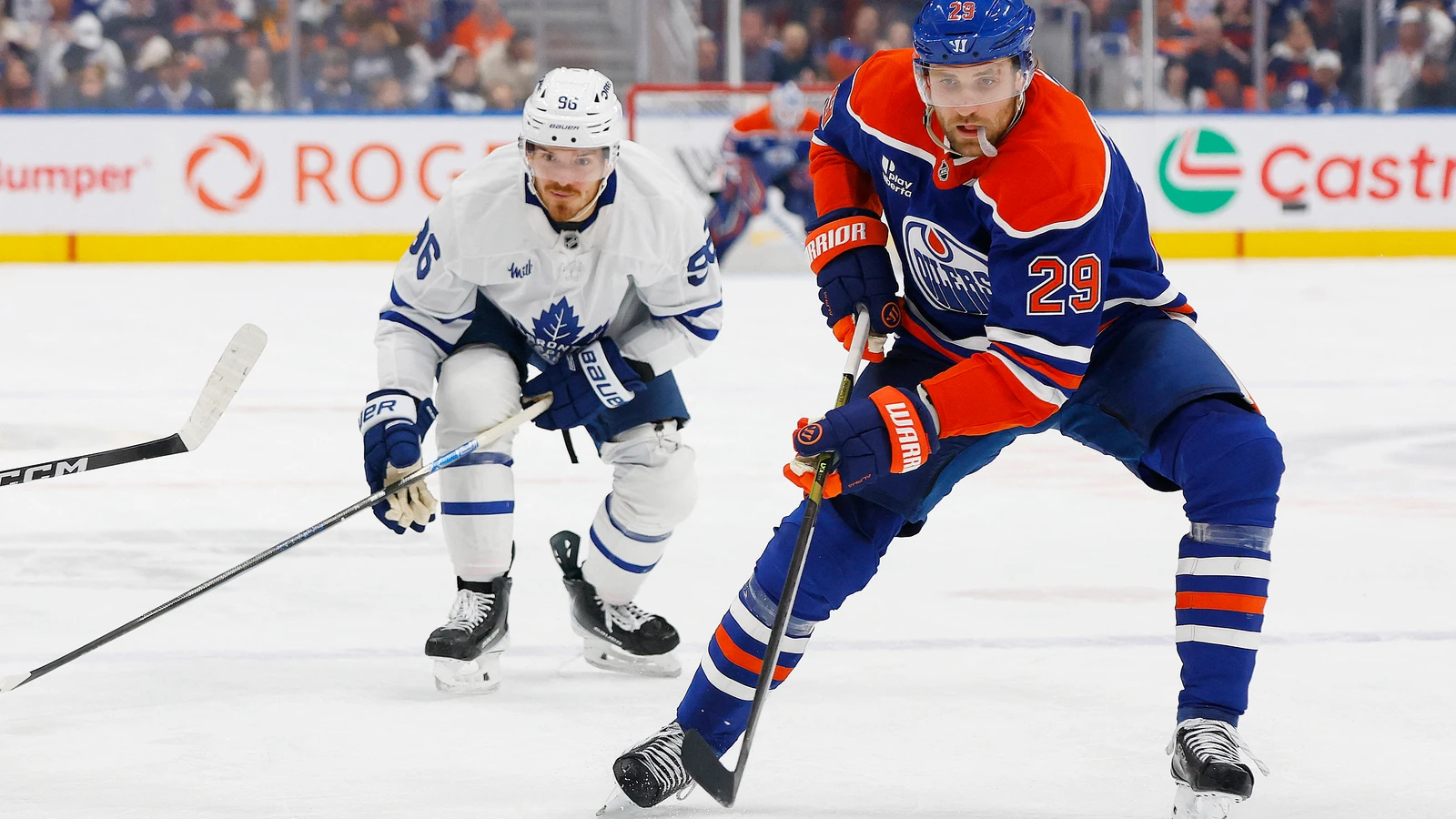 File photo: Edmonton Oilers forward Leon Draisaitl controls the puck in front of Toronto Maple Leafs forward Jack Roslovic at Rogers Place.