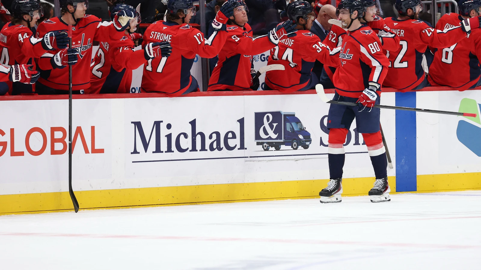 File photo: Pierre-Luc Dubois celebrates with Capitals teammates at the bench after scoring against Pittsburgh.
