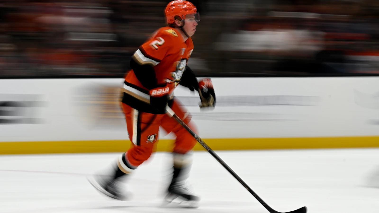 File photo: Anaheim Ducks defenceman Jackson LaCombe skates with the puck against the Boston Bruins.